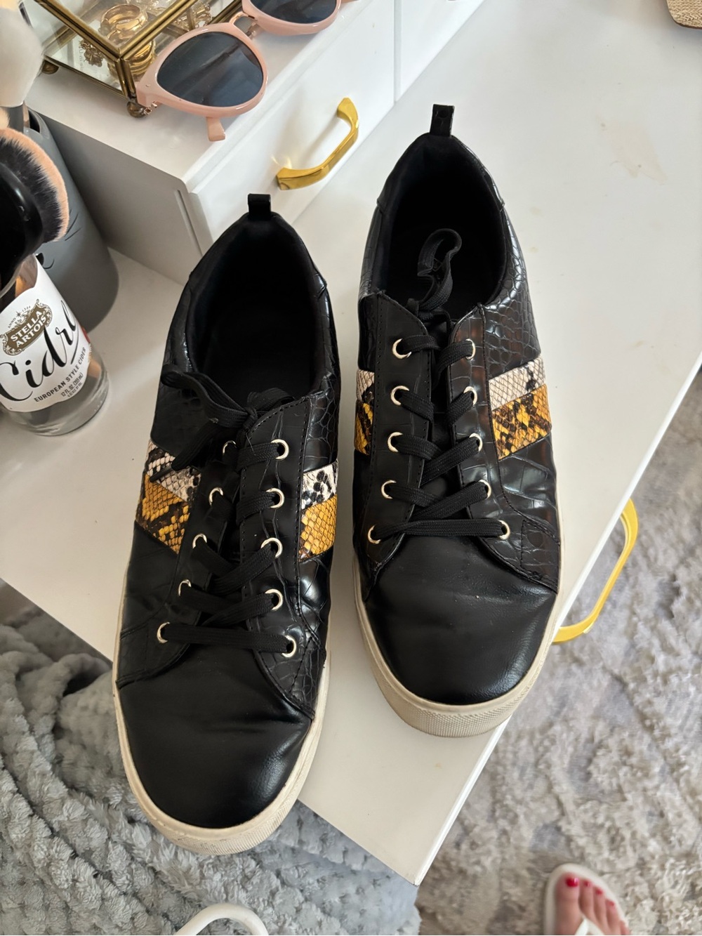 Call It Spring Black Sneakers with Yellow Snake-Print Stripe